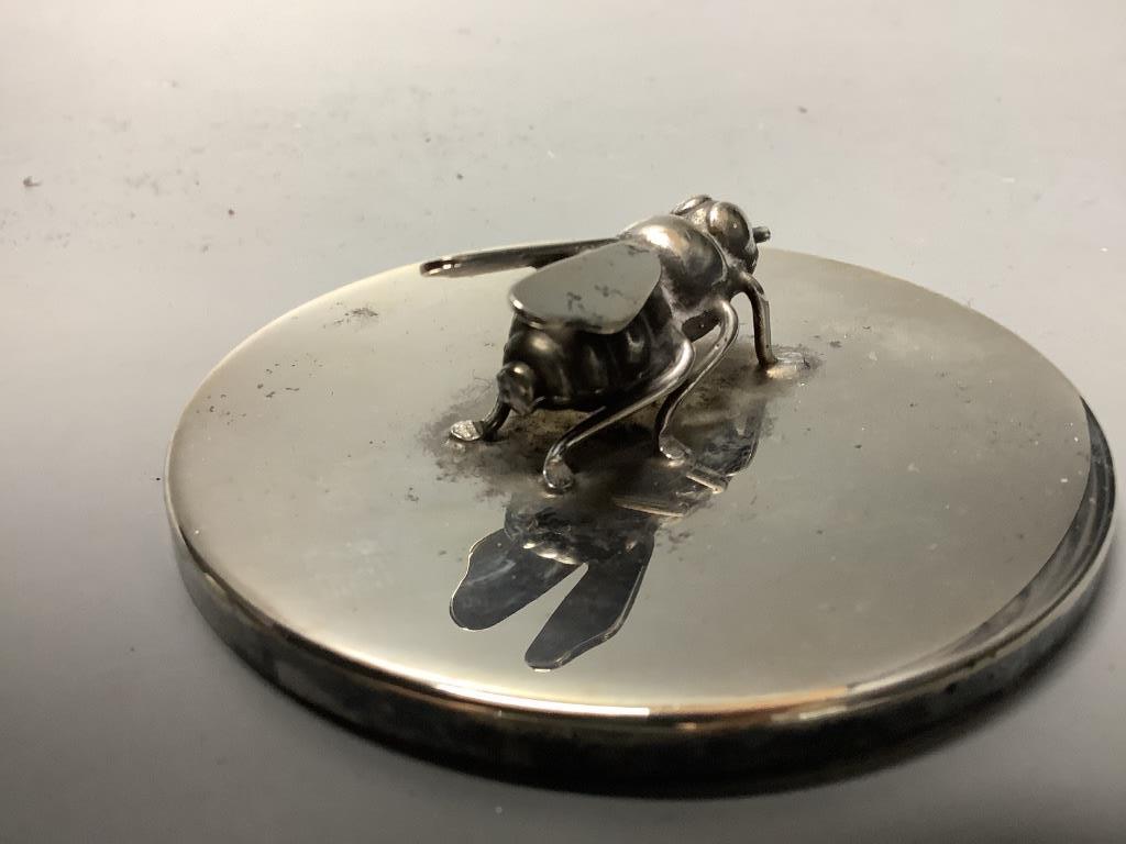 A Brazilian white metal preserve pot on stand with bee finial, height 9.2 cm
